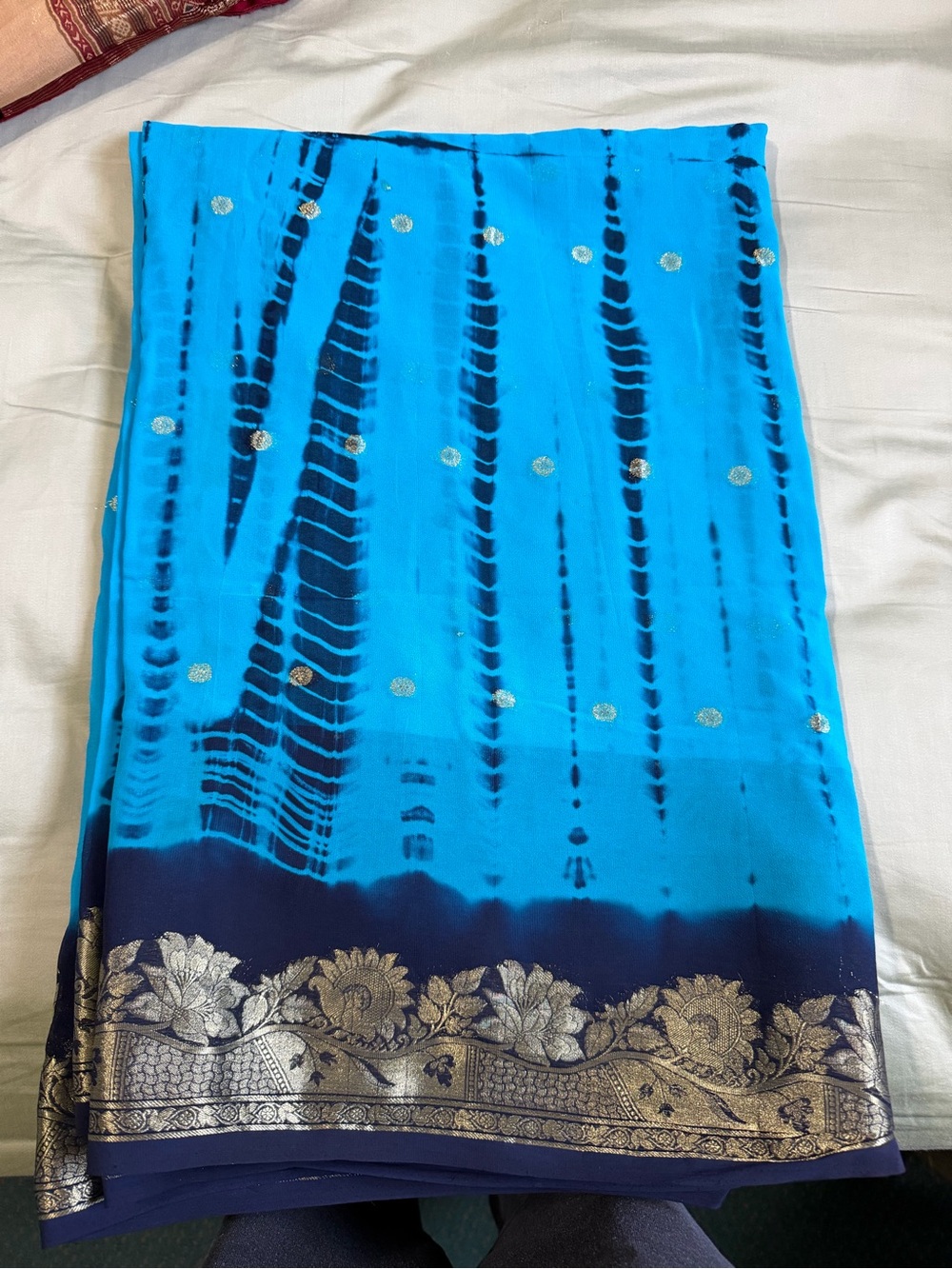 Blue Tie-Dye Patterned Saree with Gold Floral Border